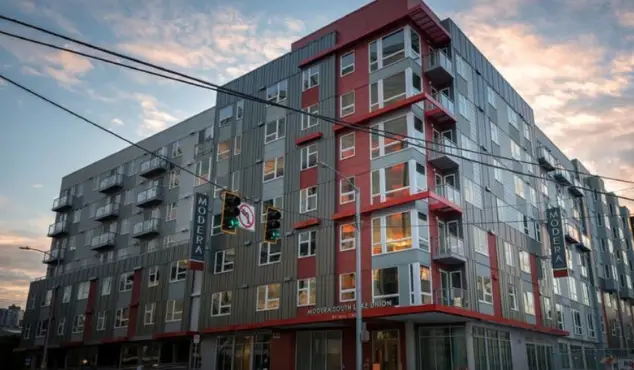Mill Creek WA main street with shops, trees, and pedestrians